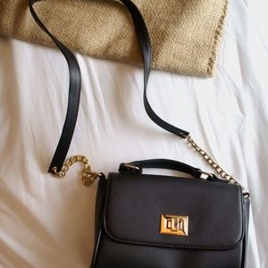 Small black and gold chain link side purse